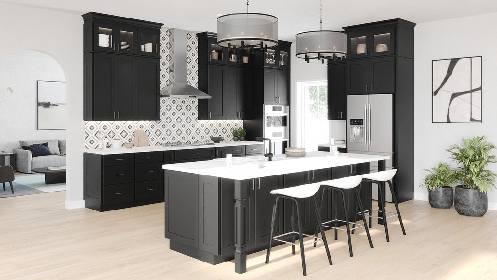 Modern shaker kitchen with black cabinets, white countertops, and stainless steel appliances.