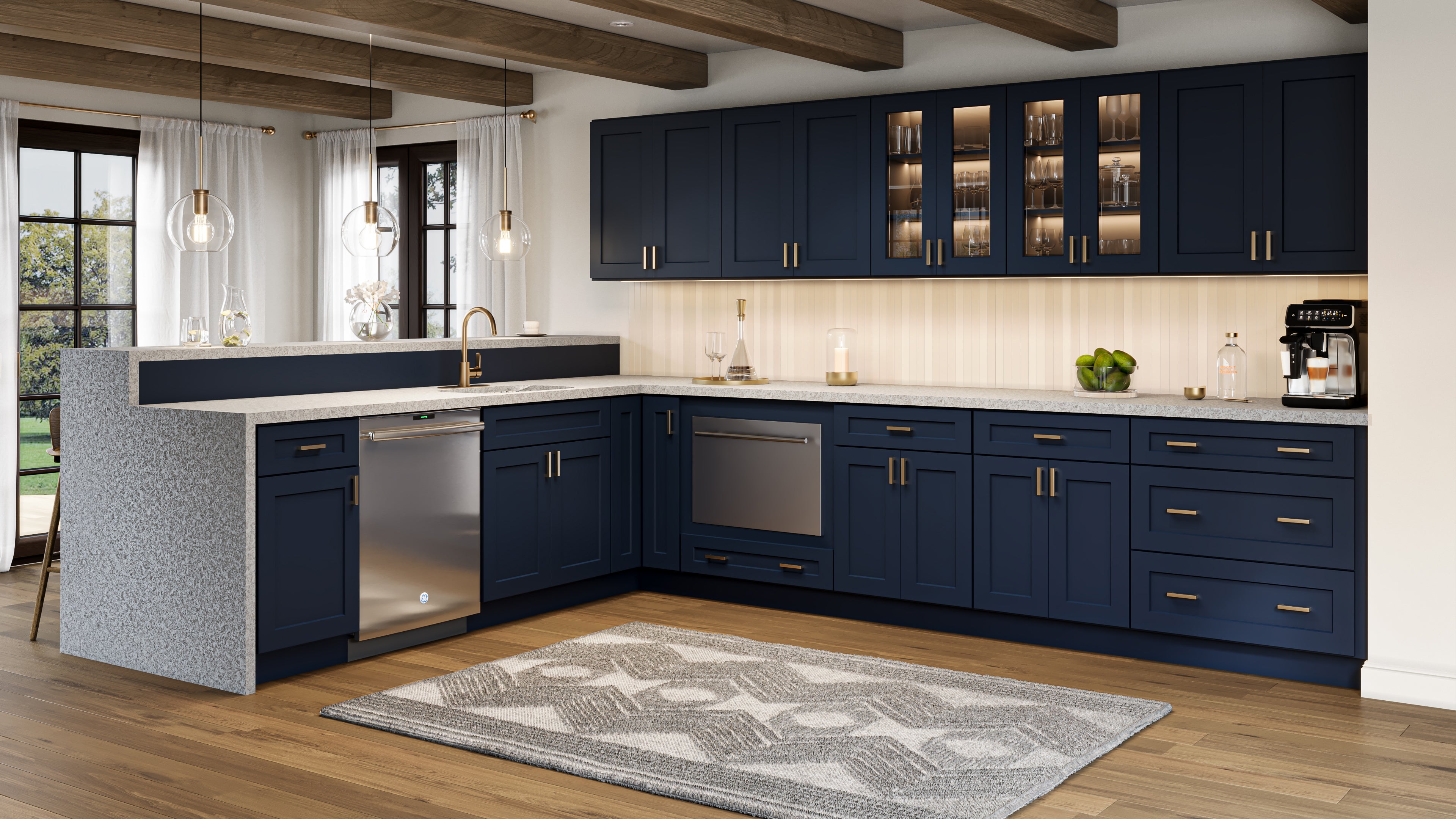Modern shaker kitchen with navy blue cabinets, white countertops, and wooden flooring.