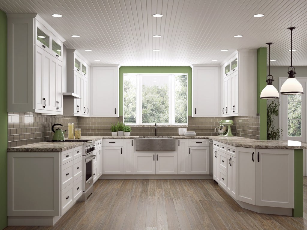 Modern kitchen with white cabinets, green trim, and large window.
